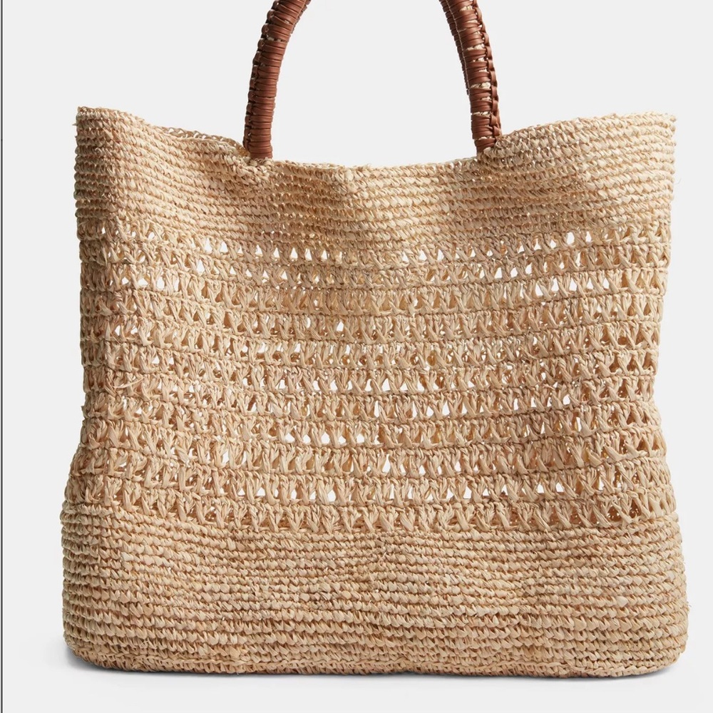 Natural Woven Tote with Brown Handles retails At $295!